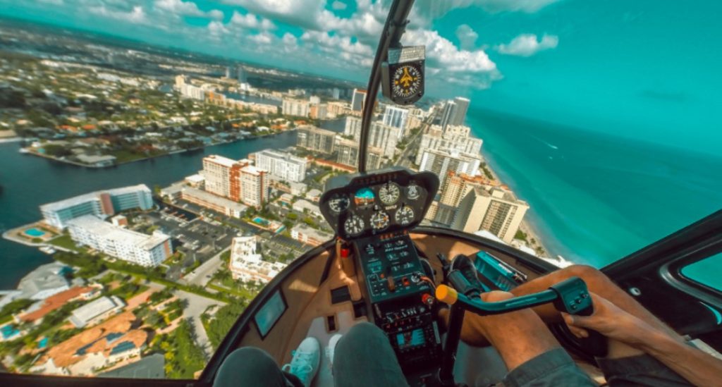 Two people in a helicopter bachelor party activities in Vegas